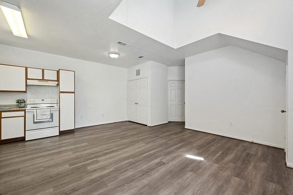 Kitchen view of living area at Fountains at Tidwell and The Enclave in Houston TX